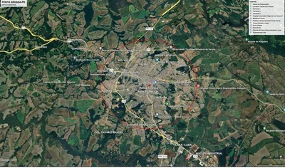 Mapa da cidade de Ponta Grossa com áreas urbanas e rodovias destacadas em fundo verde rural